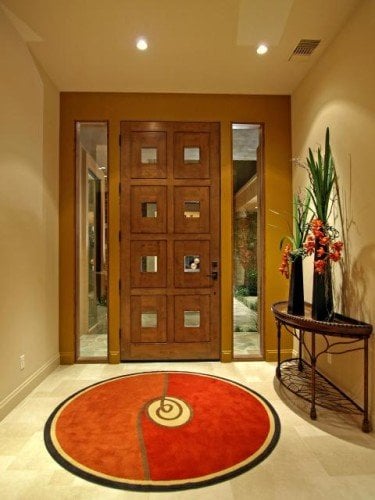 squares, rectangles and circles in entry round rug and square door features