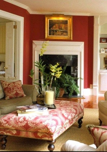 rectangular ottoman with plant, candle and books