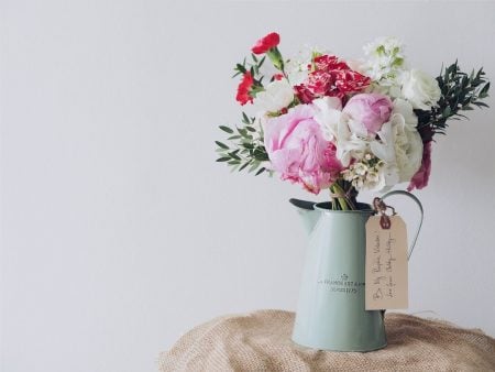 flowers in blue jar