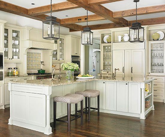 kitchen with l shaped island and built in table