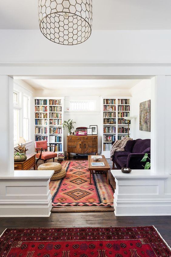 similar style rugs connect rooms