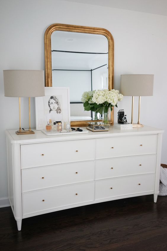 gold mirror on dresser