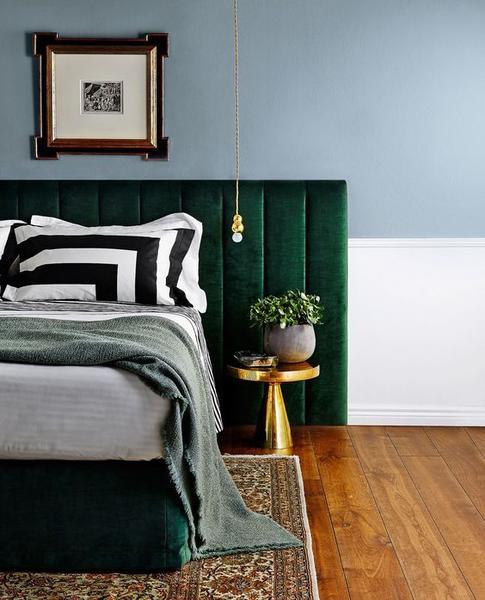 vintage accents and green headboard