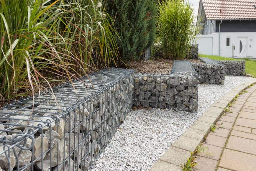 Gorgeous Suggestions For Edging Your Garden, Stone Wall Garden Border
