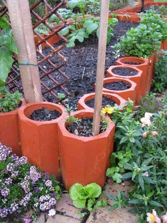 Use Terracotta Pipes for a Border of Planters