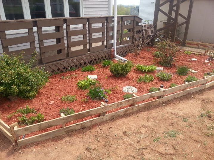 Use Pallets for a Cheap and Simple Fence