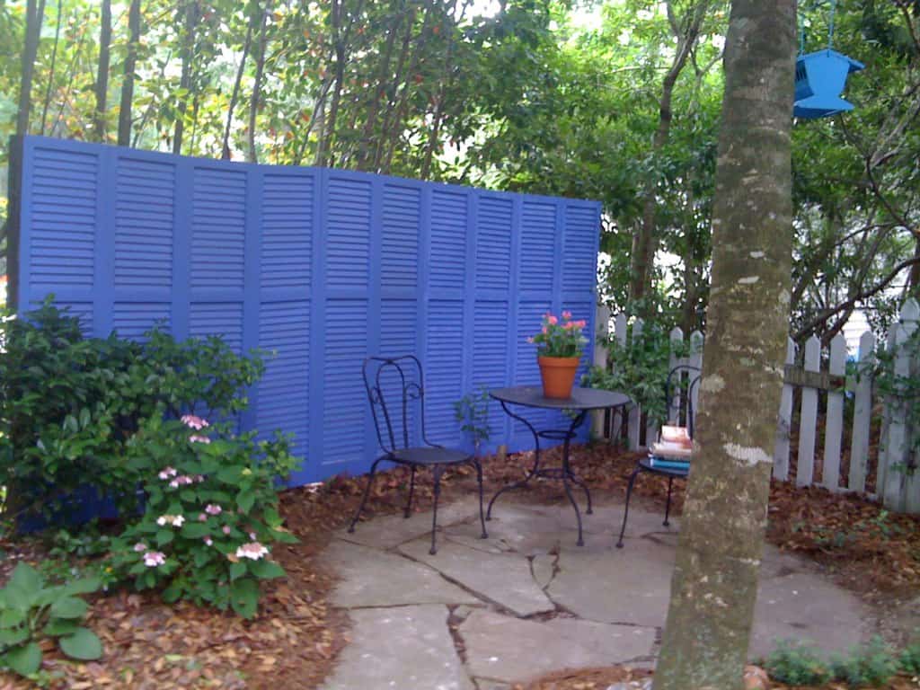 Use Old Shutters to Create a Statement Fence