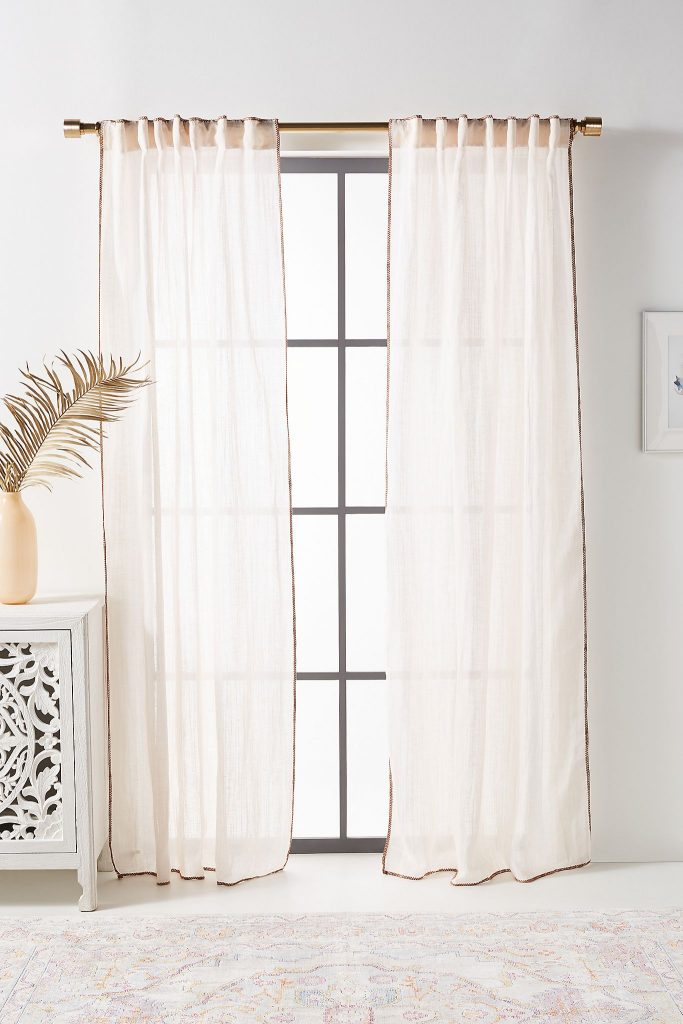 Add Glamor With a Gold-Edged Curtain