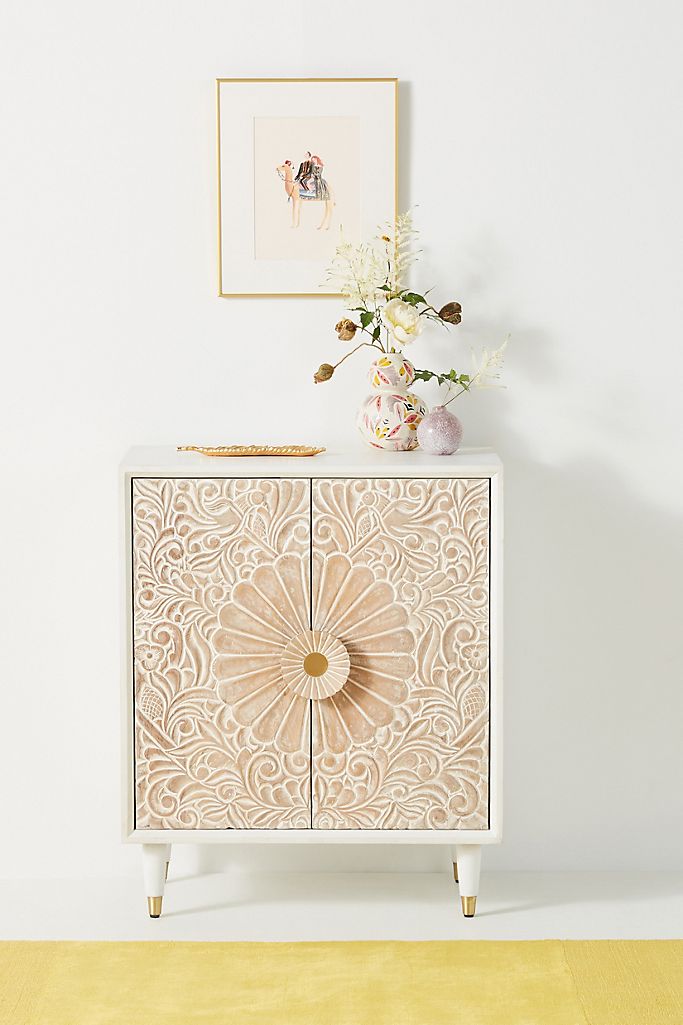 Spice Up Your Hallway With an Intricate Cabinet