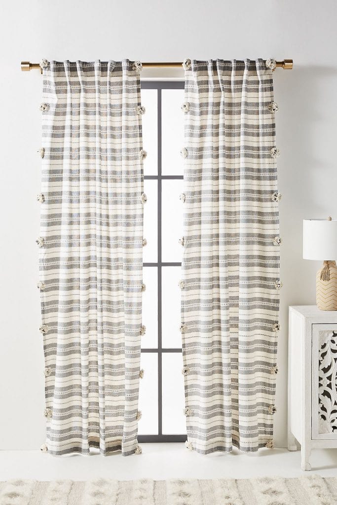 Bathroom Window Curtains Ideas / 20 Gorgeous Options For Bathroom Window Curtains / A cleavor design, these curtains are made out of the same material as your normal shower curtain, and can be easily whipped dry.