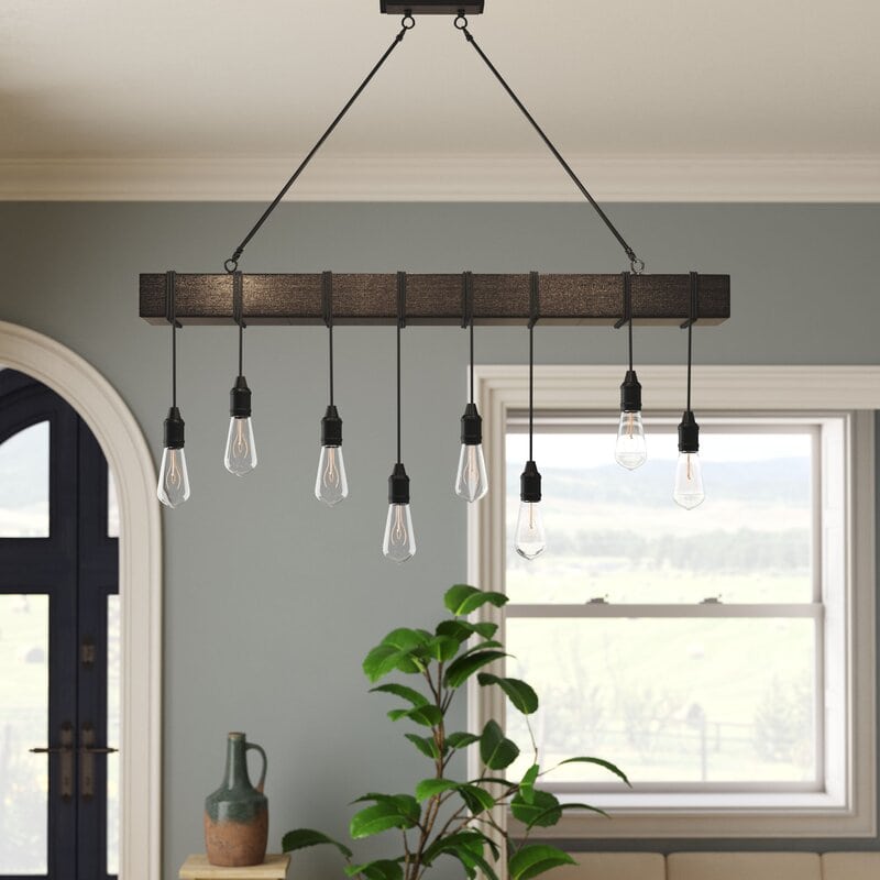 A Light Fixture with a Rectangular Wooden Base