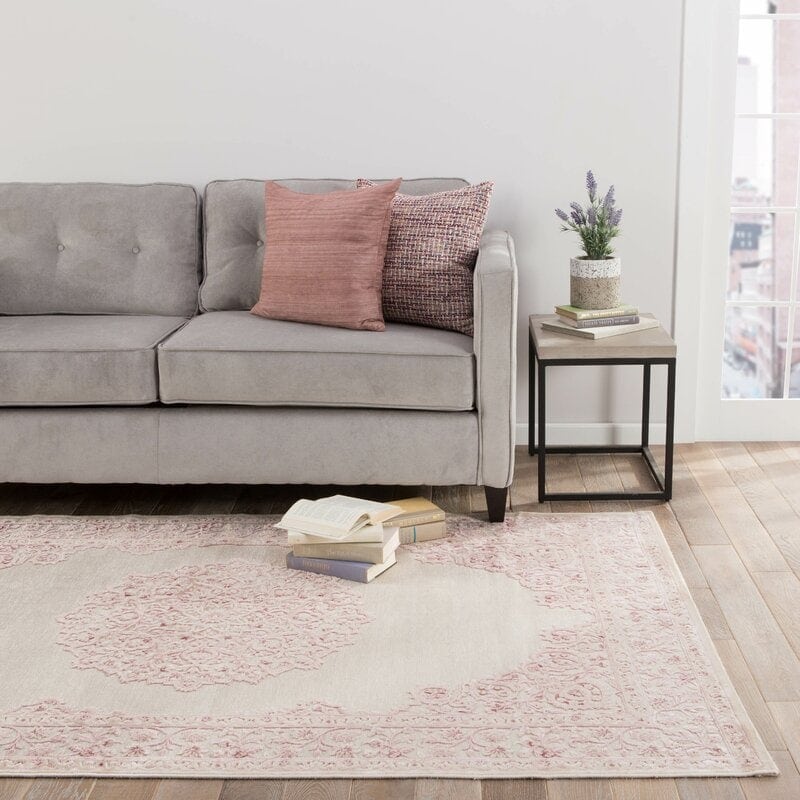 Blush Pink Throw Pillows on a Grey Couch For a Touch of Feminine Chic