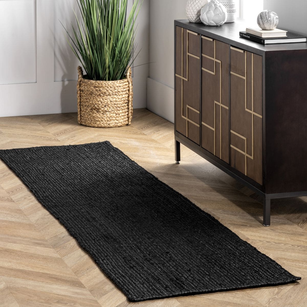 Create Contrast on Light Floors With a Black Rug