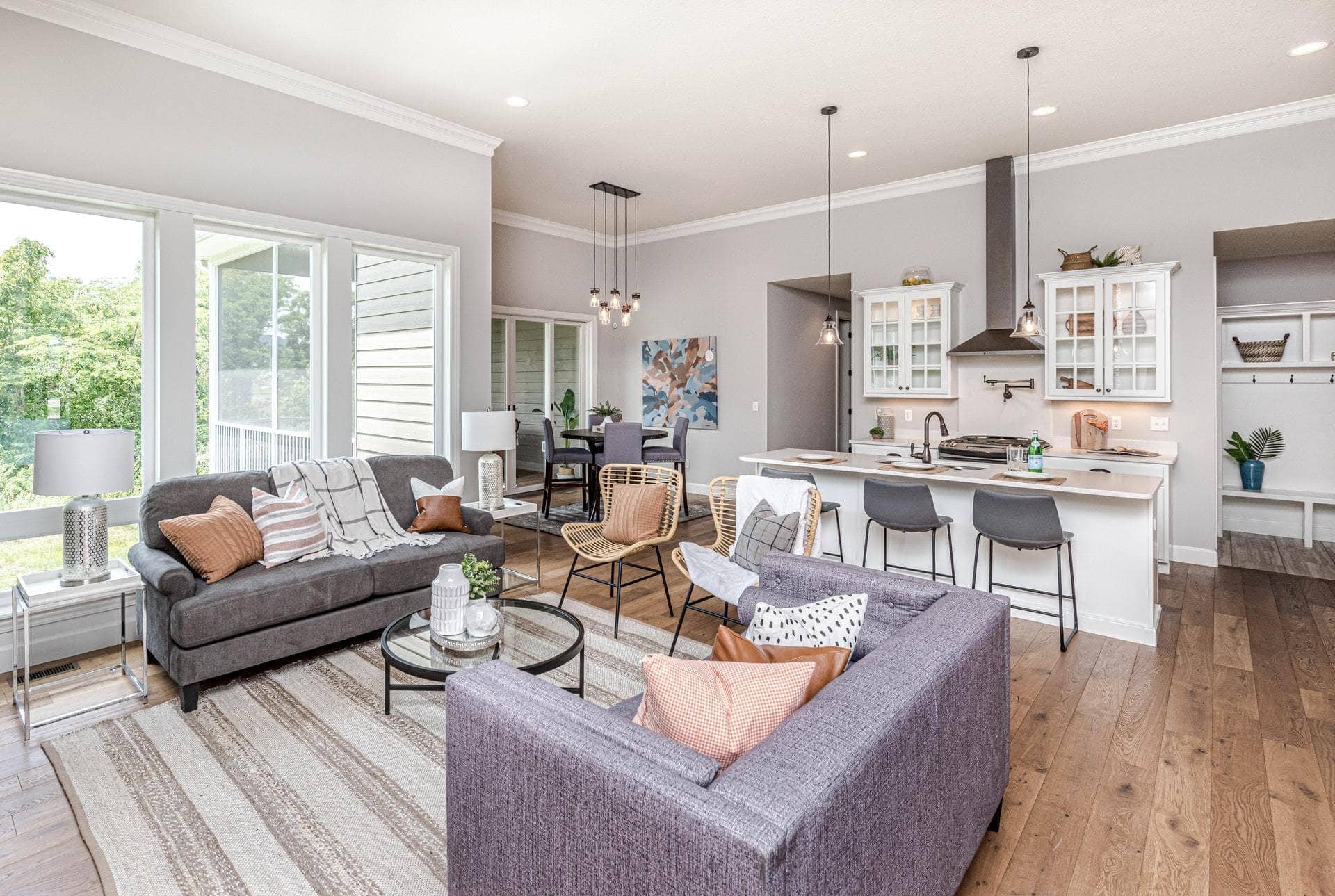 Go Natural With Taupe and White Throw Pillows on a Grey Sofa