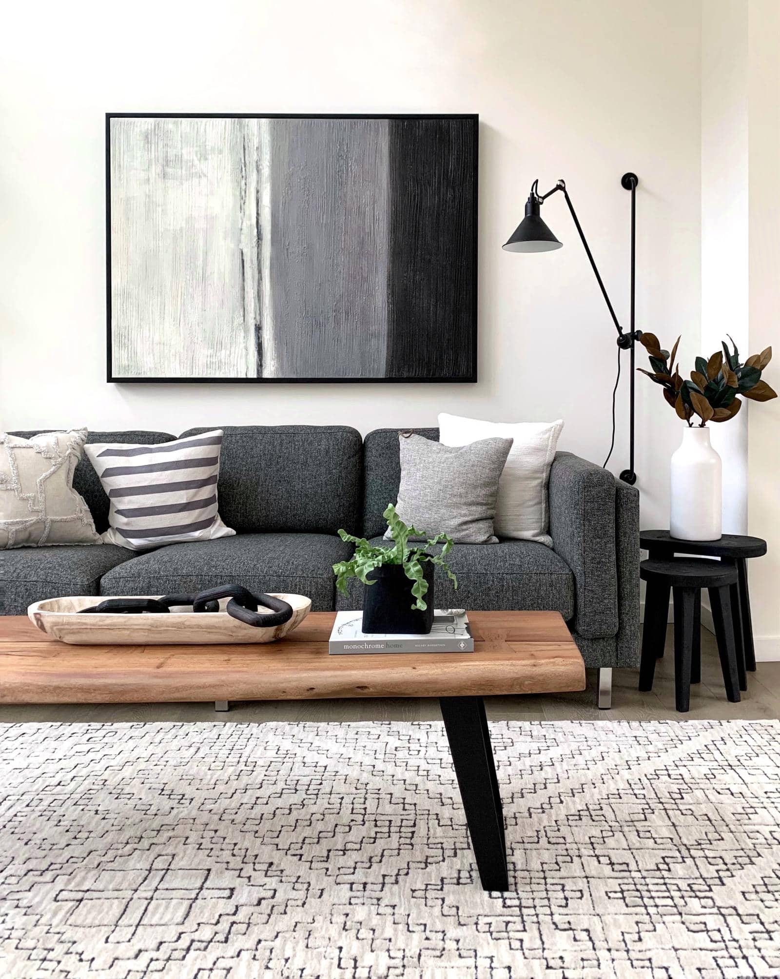 Grey and White Pillows on a Dark Grey Couch