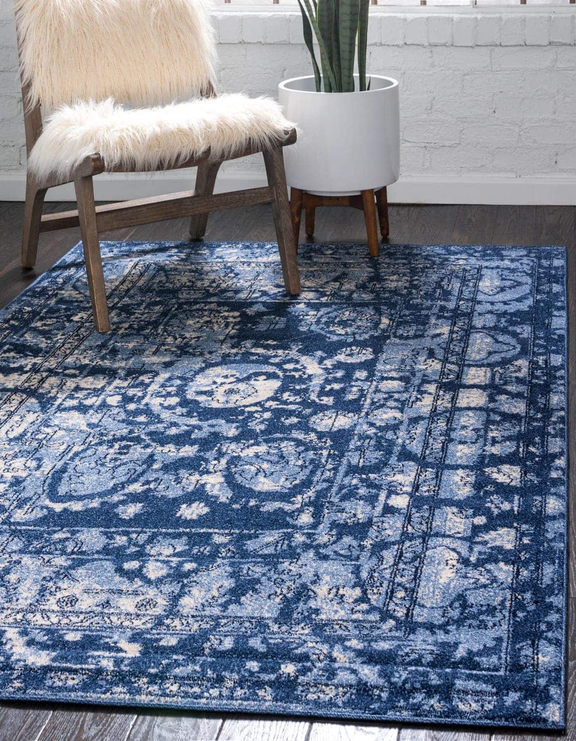 Use a Cool Blue Rug on Dark Wood for a Chic Vibe