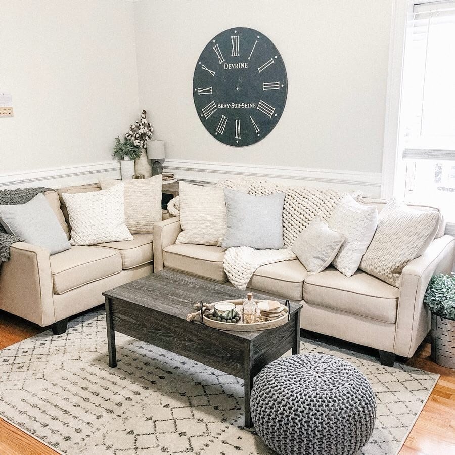 A Neutral Living Room With Grey And Teal Tones