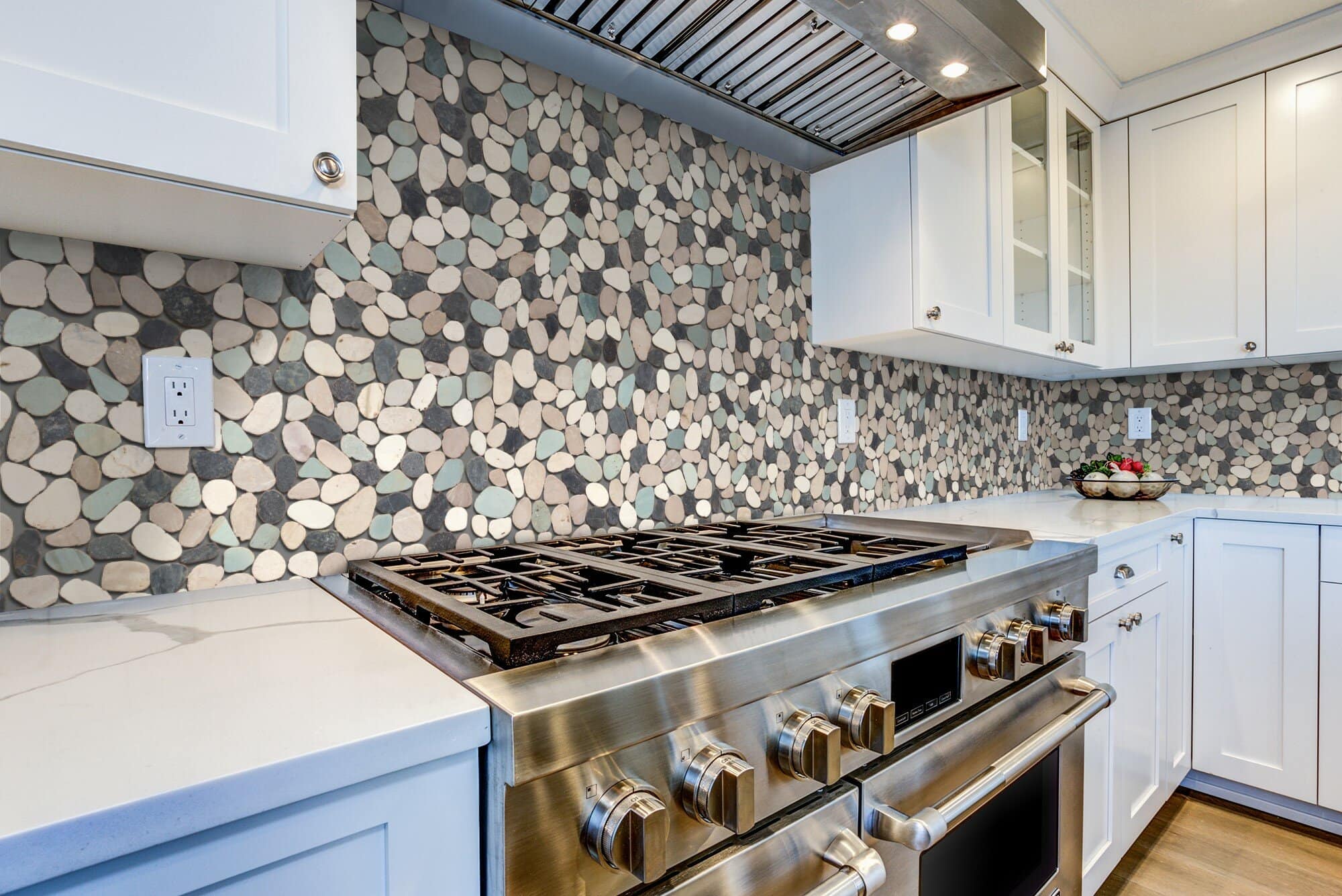 Use Pebble Tiles to Create a Rustic Kitchen Backsplash