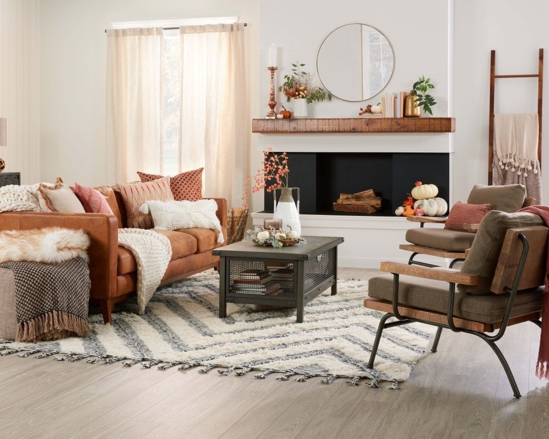 grey sofa and brown leather chair