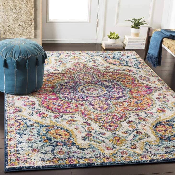 Navy Couches are Gorgeous with a Multi-Colored Medallion Rug