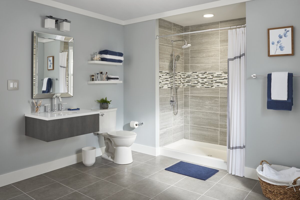 A Grey Bathroom With Blue Accents