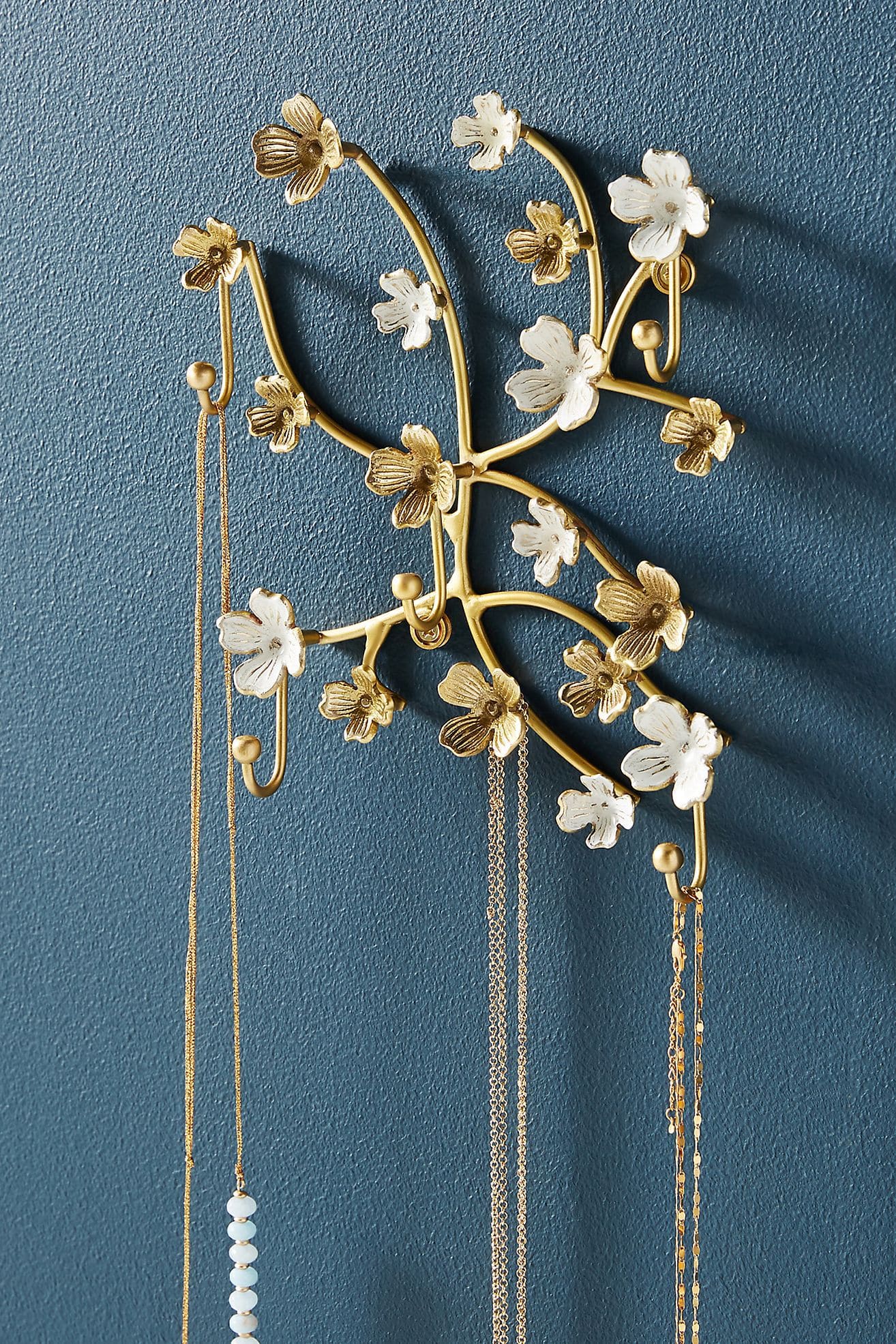 Put a Necklace Organizer on Your Bathroom Closet Door