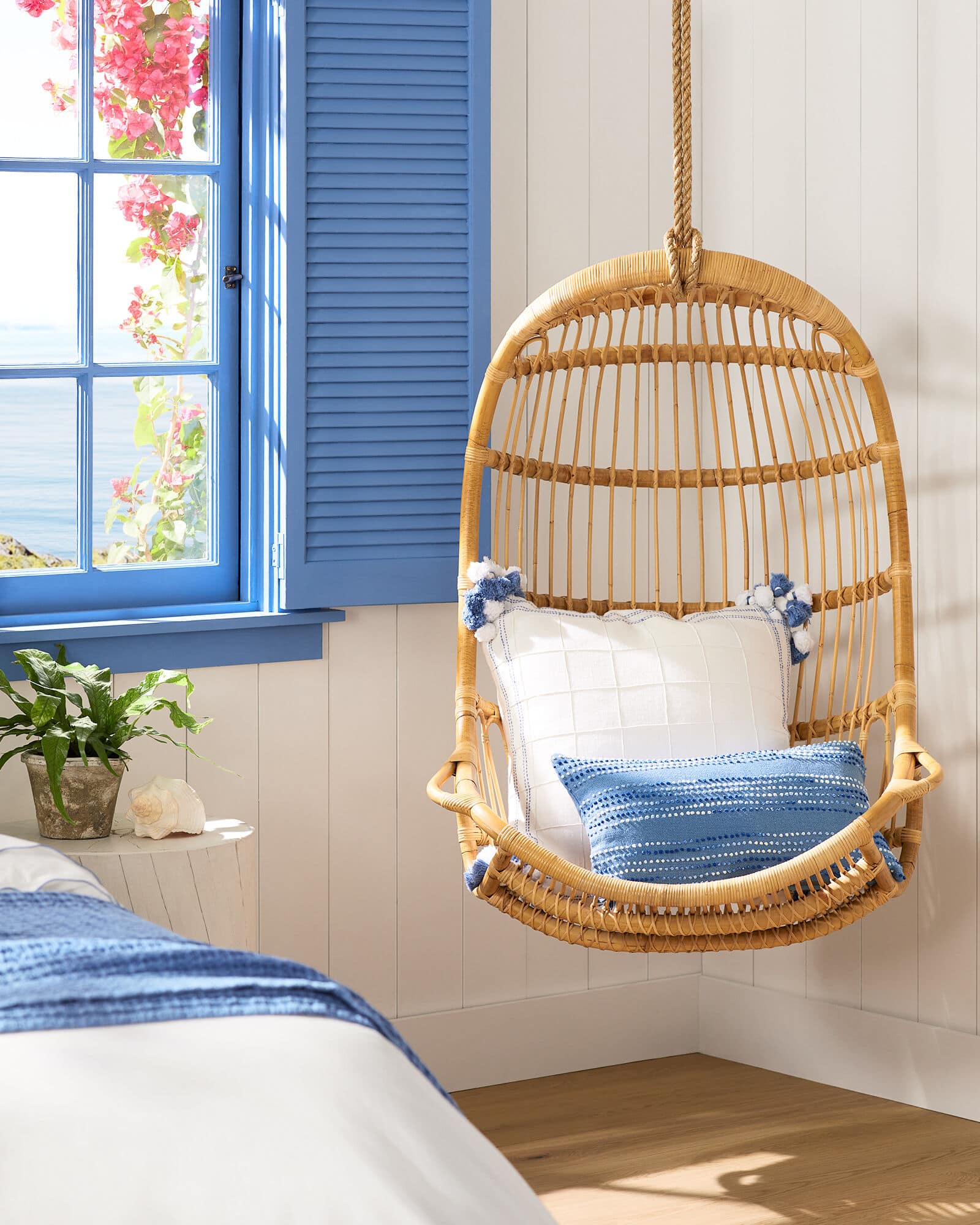 Add a Hanging Rattan Chair for a Touch of Whimsy