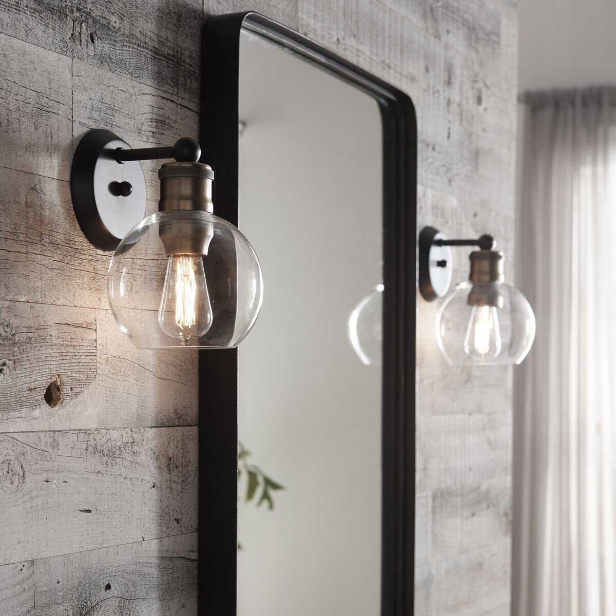 Put a Wall Sconce on Both Sides of Your Mirror