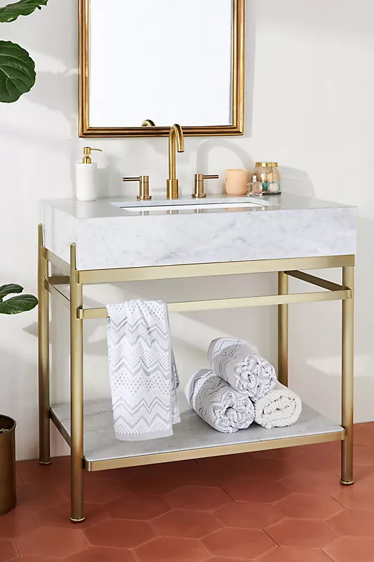 Hide Your Plumbing with a Classy Metal Shelf