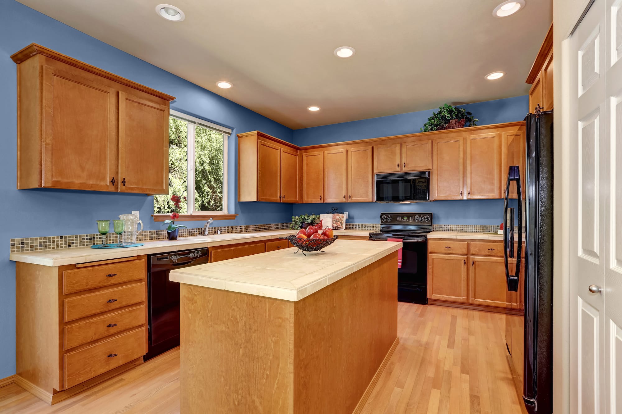 Natural cabinets with gray walls