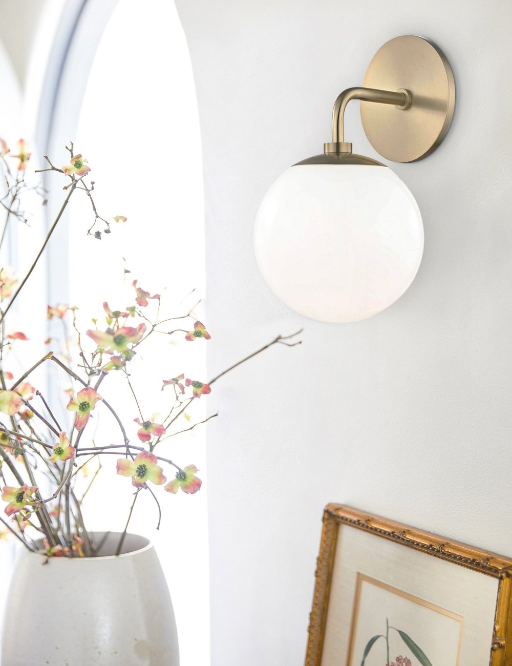 Go for a Glass Globe on a Gold Sconce