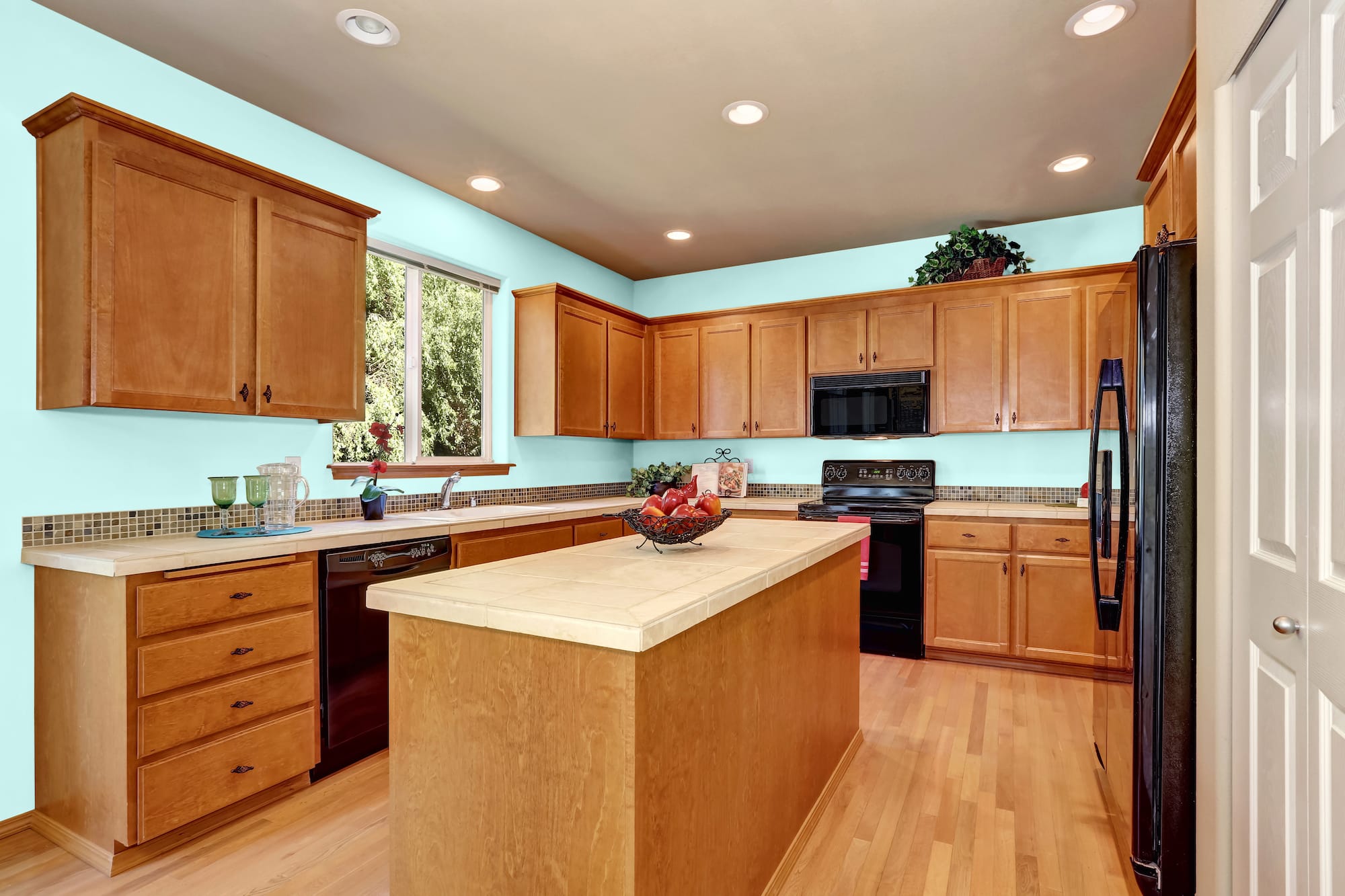 what color countertops go best with honey oak cabinets