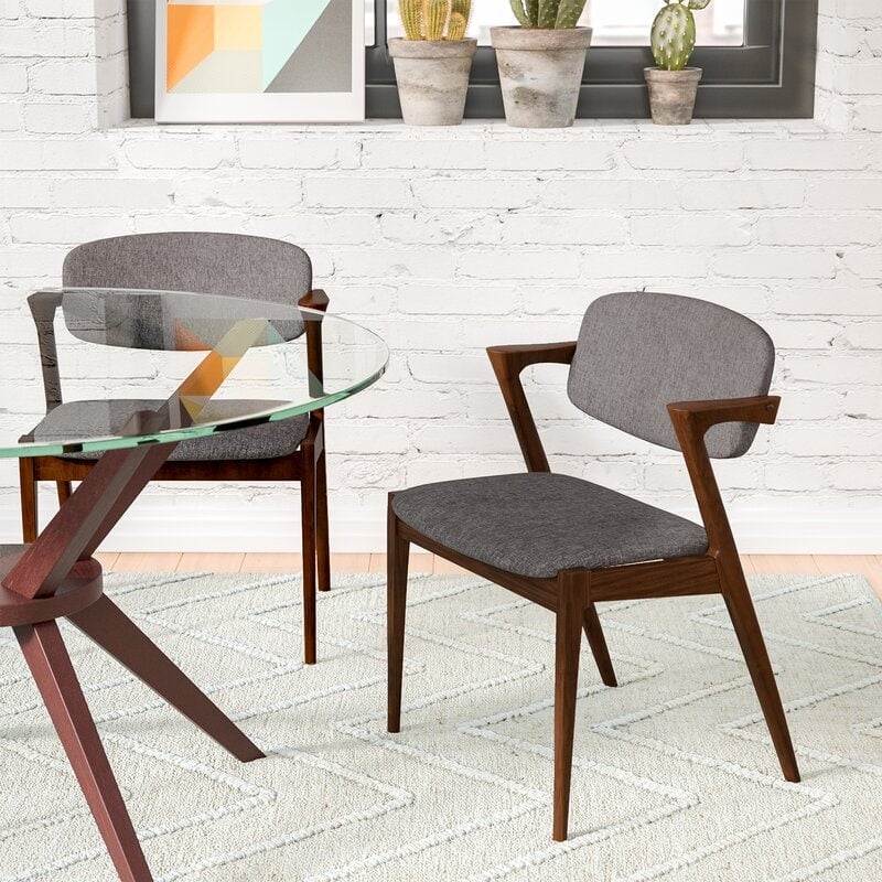 Line the Table with a Sleek Arm Chair