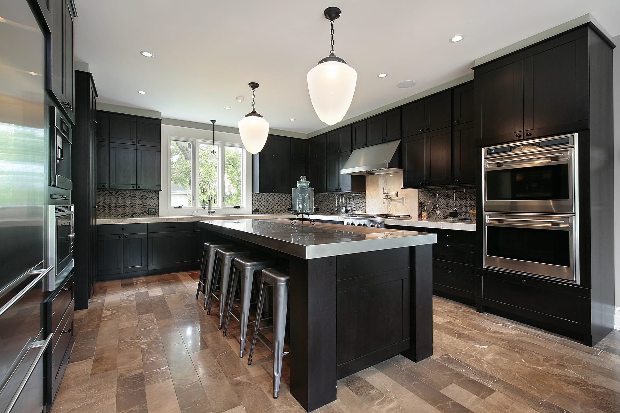 grey granite countertops with brown cabinets