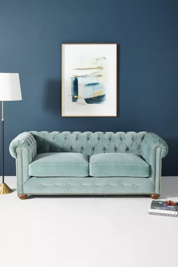 Pair Navy Walls with Soft Blue Furniture