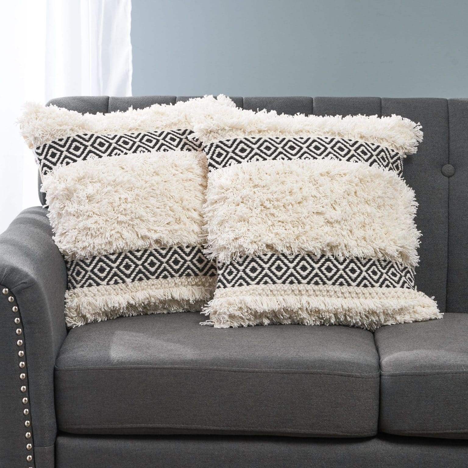 15 Throw Pillows For A Black Couch   12. Combine Boho Pillows With A Black Couch 1536x1536 