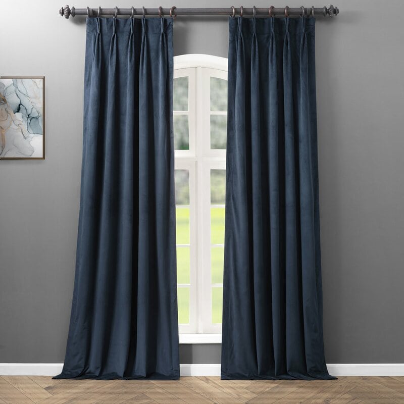 2. Try Velvet Solid Blackout Pinch Pleat Curtains