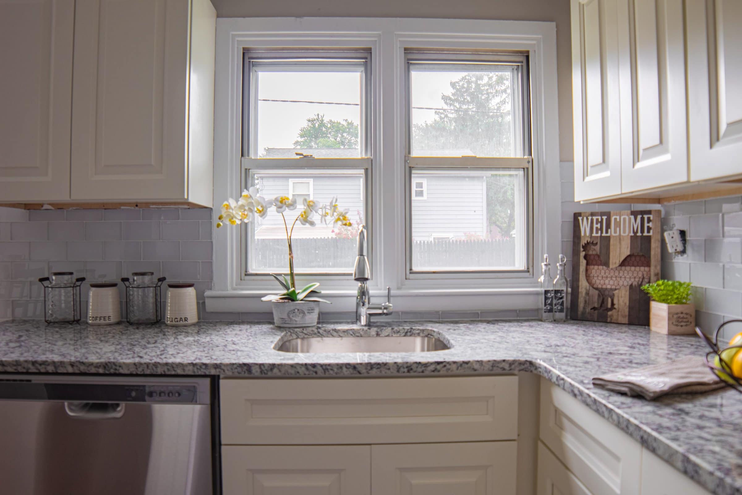  Pair a Light Grey Subway Tile with a Grey Granite Counter scaled