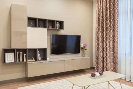 Should TV Stand Be Wider Or Longer Than TV?