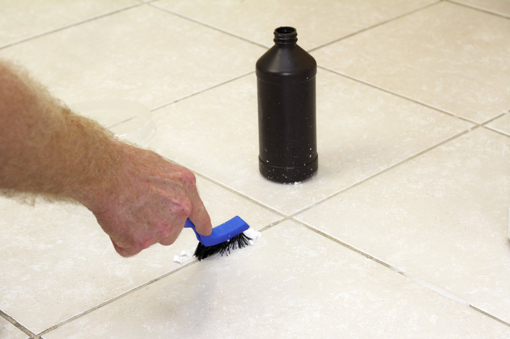  Light grout on floor tiles needs lots of cleaning