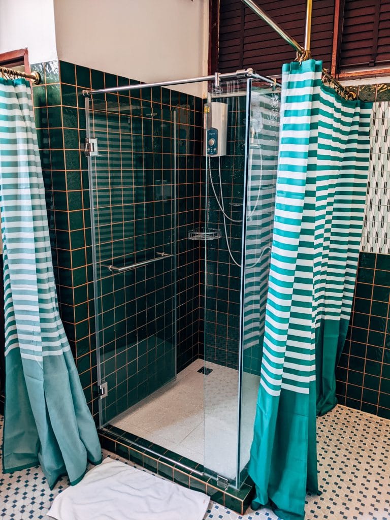 Should Shower Curtains Touch The Floor?