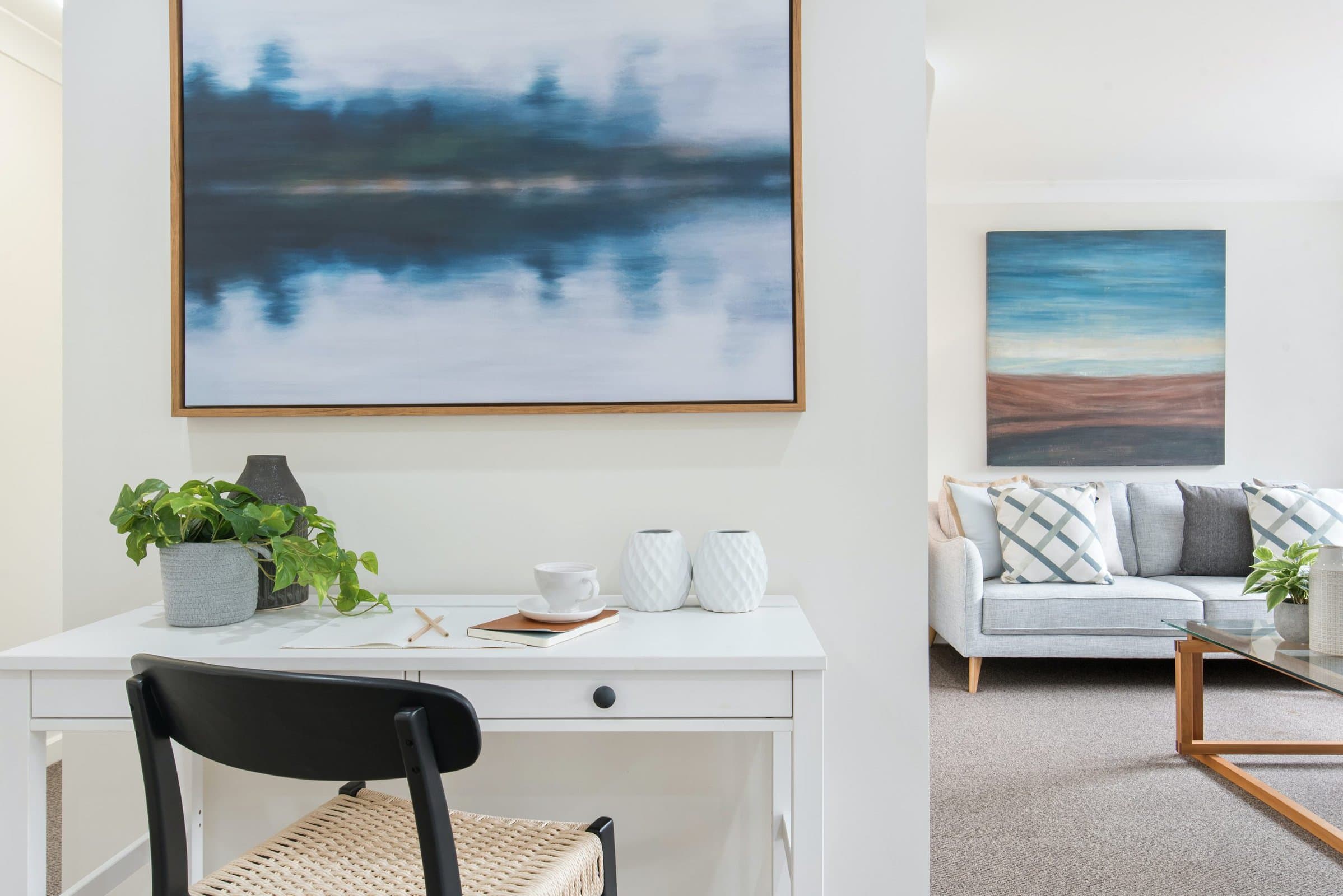  A White Wooden Desk Looks Stunning in a Modern Coastal Office scaled